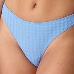 Model wearing 'Avero' Pastel Blue Thong, by Marie Jo (front view, close-up).