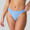 Model wearing 'Avero' Pastel Blue Thong and Bra, by Marie Jo (front view).