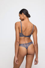 Model wearing 'Jane' Blue Shadow Half Padded Balcony Bra, by Marie Jo (back view).