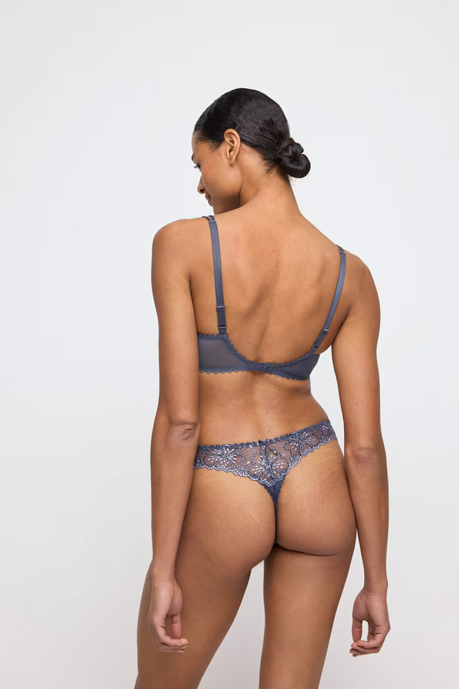 Model wearing 'Jane' Blue Shadow Half Padded Balcony Bra, by Marie Jo (back view).