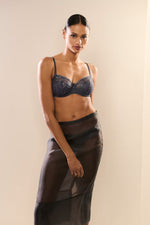 Model wearing 'Jane' Blue Shadow Half Padded Balcony Bra, by Marie Jo (front view).