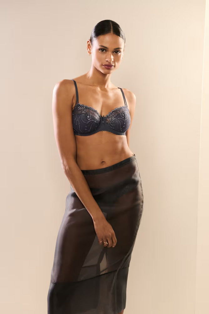 Model wearing 'Jane' Blue Shadow Half Padded Balcony Bra, by Marie Jo (front view).