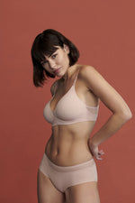 Model wearing 'Louie' Soft Pink Full Cup Bra, by Marie Jo.