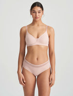 Model wearing 'Louie' Soft Pink Full Cup Bra, by Marie Jo (front view).