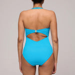 Model wearing 'Cherilyn' Full Cup Swimsuit, by Marie Jo (back view with halterneck straps).