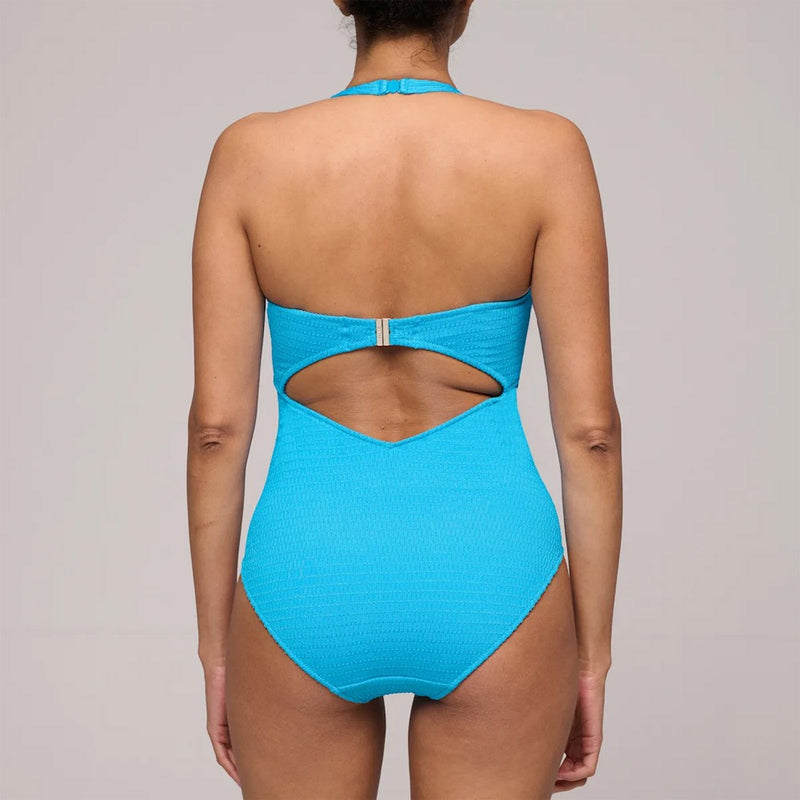 Model wearing 'Cherilyn' Full Cup Swimsuit, by Marie Jo (back view with halterneck straps).
