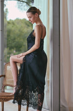 Model wearing 'Appoline' Long Slit Black Silk and Lace Nightie, by Marjolaine (side back view).