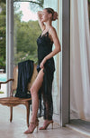 Model wearing 'Appoline' Long Slit Black Silk and Lace Nightie, by Marjolaine (side view).