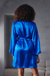 Model wearing 'Betty' Short Blue Silk Robe, by Marjolaine (back view).