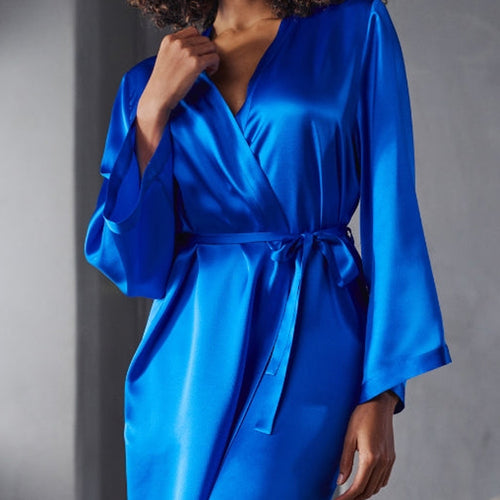 Model wearing 'Betty' Short Blue Silk Robe, by Marjolaine (front view, close up).