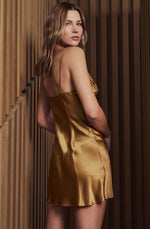 Model wearing 'Bénédicte' Hazelnut Short Silk Nightie, by Marjolaine (back view).
