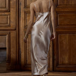 Model wearing Soie Unie 'Odana' Sable Long Silk Nightdress, by Marjolaine (back view).