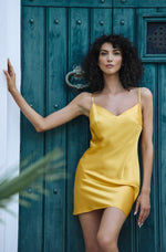 Model wearing 'Tracy' Yellow Silk Chemise, by Marjolaine (front view).