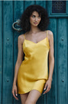 Model wearing 'Tracy' Yellow Silk Chemise, by Marjolaine (front view).