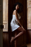 Model wearing 'Tracy' White Silk Chemise, by Marjolaine (side view).