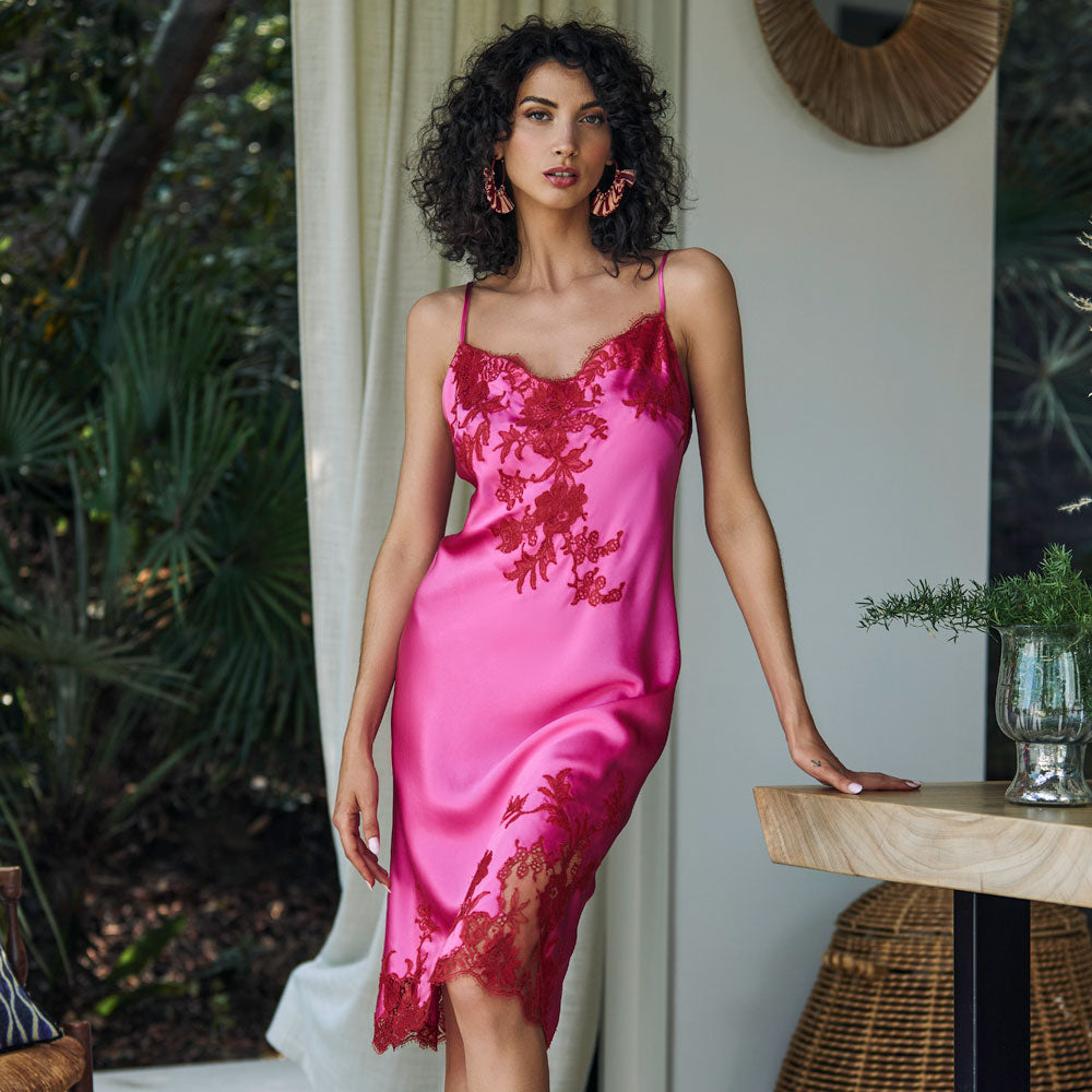 Model wearing 'Tina' Nightdress in Dahlia and Garnet (Pink and Red), by Marjolaine.