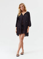 Model wearing 'Ashley' Black Kaftan, by Melissa Odabash.