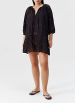 Model wearing 'Ashley' Black Kaftan, by Melissa Odabash.