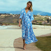 Model wearing 'Cecilia' Lotus Blue Maxi Beach Dress, by Melissa Odabash (front view).