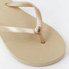 Melissa Odabash Gold Flip Flops (detail).