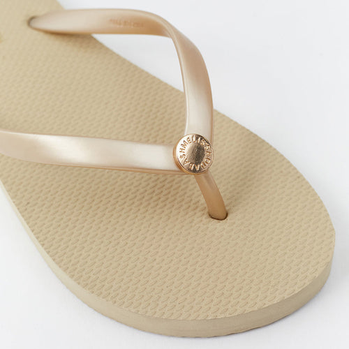 Melissa Odabash Gold Flip Flops (detail).