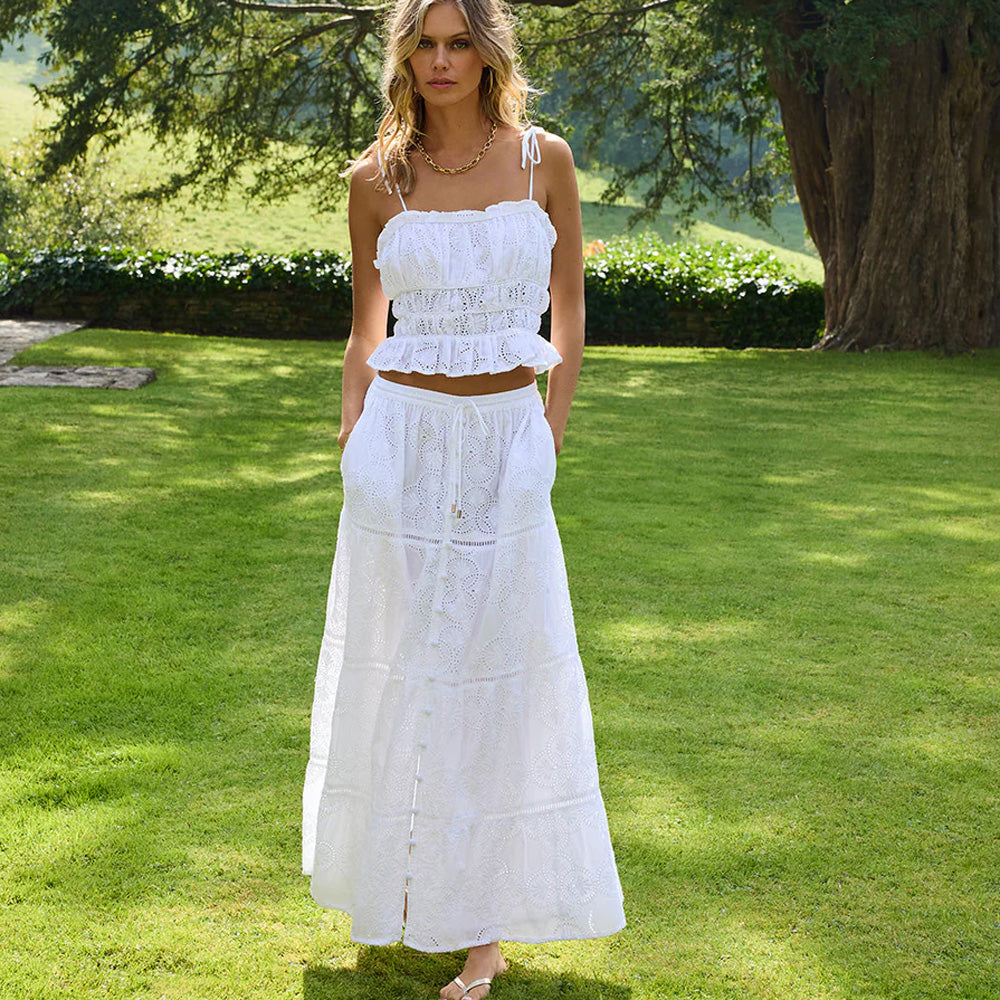 Model wearing 'Cinzia' White Skirt, by Melissa Odabash (front view).