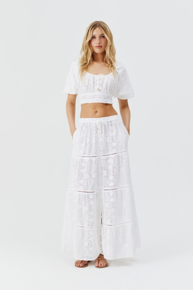 Model wearing 'Cinzia' White Skirt, by Melissa Odabash (front view).