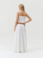 Model wearing 'Cinzia' White Skirt, by Melissa Odabash (back  view).