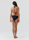 Model wearing 'Grenada' Black Halterneck Bikini Set, by Melissa Odabash (back view).
