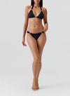 Model wearing 'Grenada' Black Halterneck Bikini Set, by Melissa Odabash (front view).