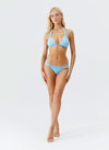 Model wearing 'Grenada' Pale Blue Halterneck Bikini Set, by Melissa Odabash.