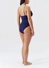 Model wearing 'Panarea' Navy Swimsuit, by Melissa Odabash (back view).