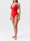 Model wearing 'Panarea' Red Swimsuit, by Melissa Odabash (front view).