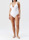 Model wearing 'Panarea' White Swimsuit, by Melissa Odabash (front view).