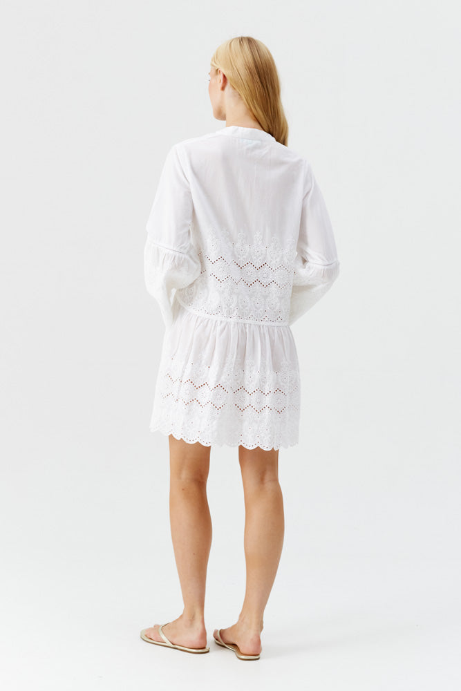 Model wearing 'Sebena' White Short Kaftan, by Melissa Odabash (back view).