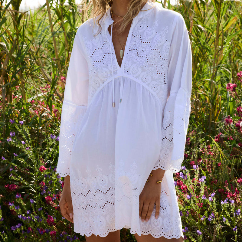 Model wearing 'Sebena' White Short Kaftan, by Melissa Odabash (front view, close-up).