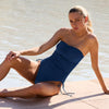 Model wearing 'Sydney' Marine Bandeau Swimsuit, by Melissa Odabash (front view).