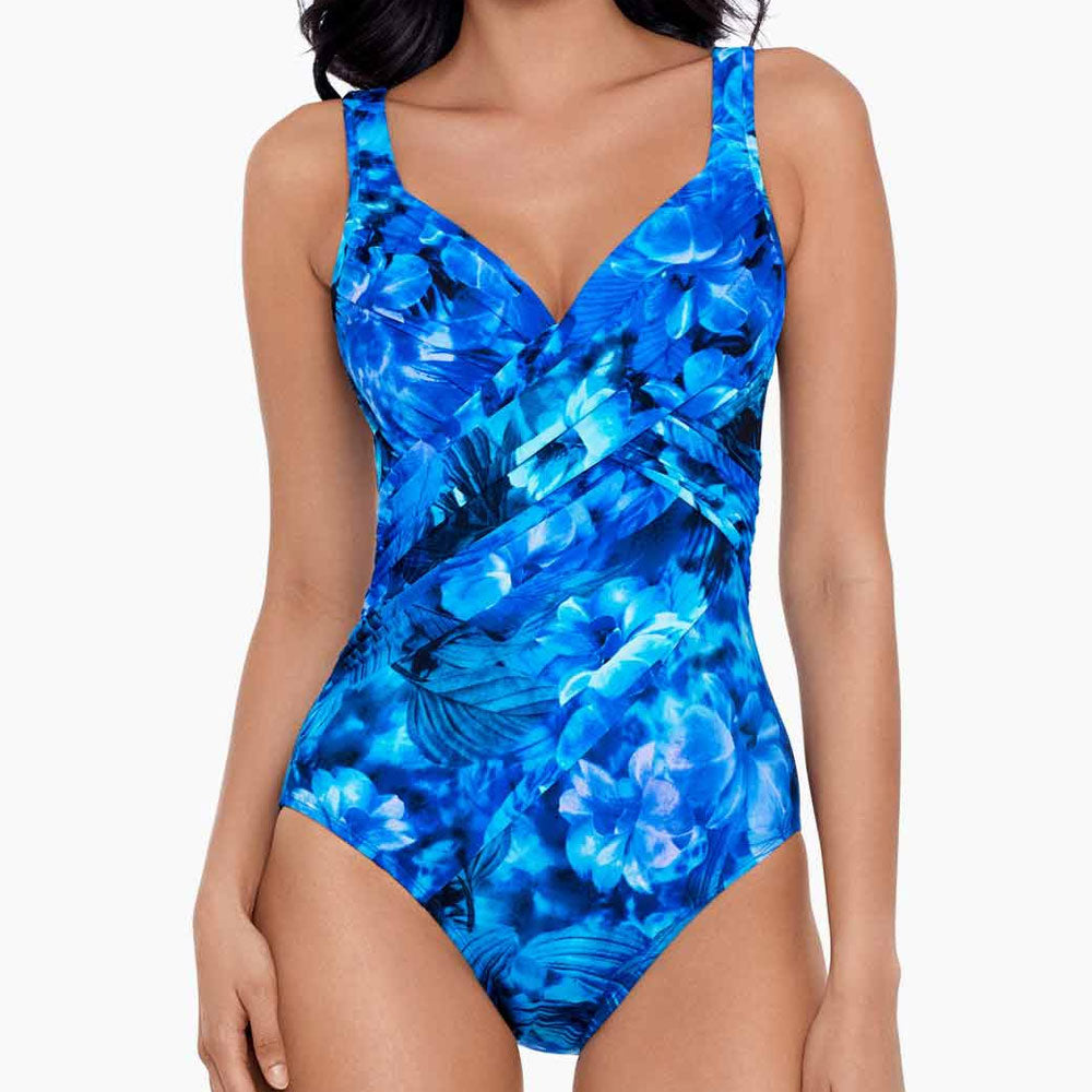 Model wearing Sous Marine collection 'Revele' Swimsuit in Blue, by Miraclesuit .