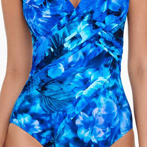 Model wearing Sous Marine collection 'Revele' Swimsuit in Blue, by Miraclesuit .