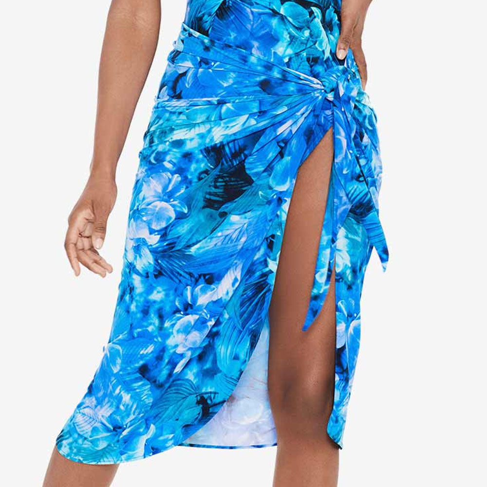 Model wearing Sous Marine collection Sarong in Blue, by Miraclesuit.