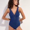 Model wearing 'Bonnie' Blue Plunge Swimsuit, by Pain de Sucre (front view).