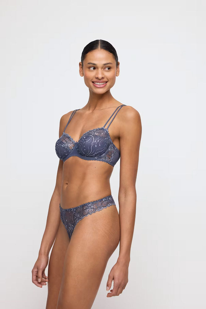 Model wearing 'Jane' Blue Shadow Half Padded Balcony Bra, by Marie Jo.