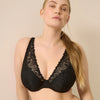 Model wearing 'Rupi' Black Half Padded Plunge Bra, by PrimaDonna Twist (front view, close up).
