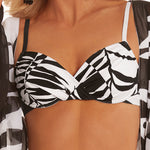 Model wearing 'Adara' Black and White Bikini Top, by Roidal.