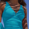 Model wearing 'Nidia' Sicilian Turquoise Swimsuit, by Roidal (front view, close up).