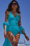 Model wearing 'Nidia' Sicilian Turquoise Swimsuit, by Roidal (front view).