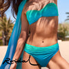 Model wearing 'Ocra' Turquoise/Green Ombre Bikini Set, by Roidal (front view).