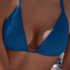Model wearing 'Halley' Sea Blue Halterneck Bikini Set, by Roidal (front view, close up).
