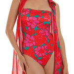 Model wearing Floreale collection 'Acapulco' Bandeau Swimsuit in Crimson, by Roidal (cropped).
