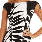 Model wearing 'Nil' Black and White Resort Dress, by Roidal (close-up).